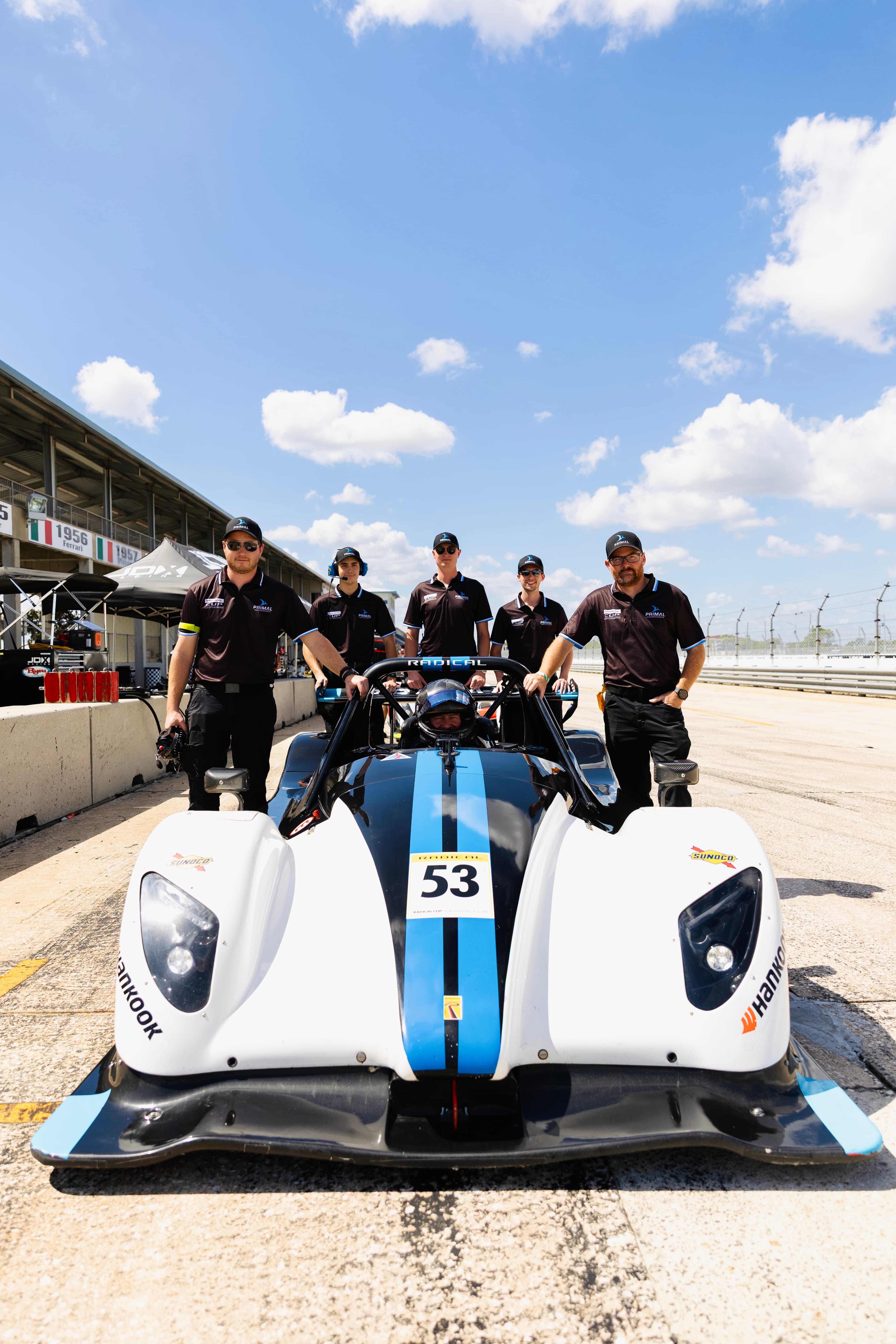 Primal crew preparing Radical race cars — technical operations