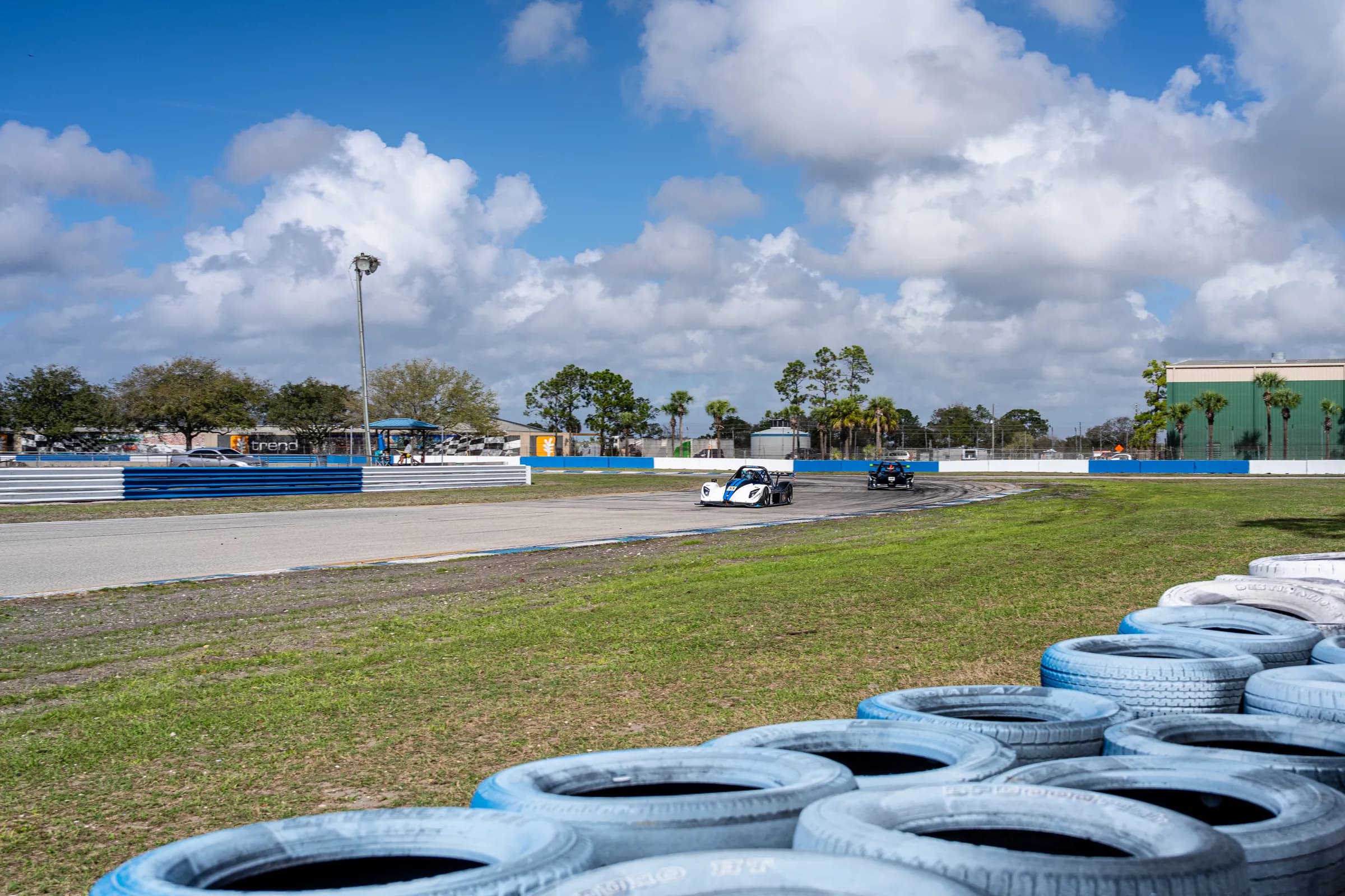 Radical race cars in wheel-to-wheel action — advanced school